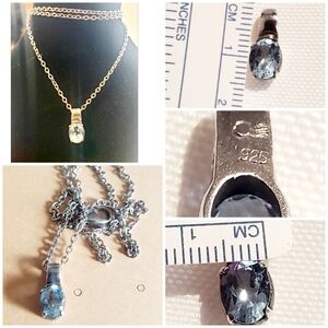Elegant 925 Silver Blue Topaz Pendant W/ stainless steel chain.
